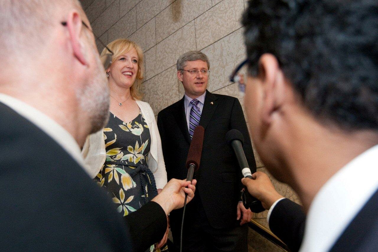 Speaking with reporters with Prime Minister Harper